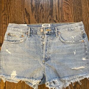 Agolde Blue Jean Shorts with Distressed Details and Raw Hem
